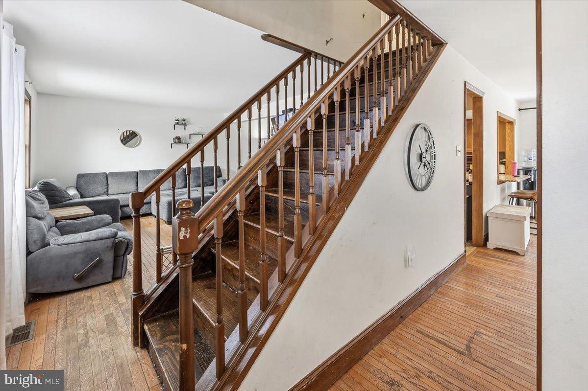 2414 Church Road Cinnaminson, NJ 08077 - Photo 12 of 41 Inviting entryway with classic wooden stairs.