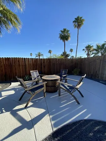 a view of a lounge chairs in patio