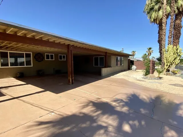 a house view with a garden space