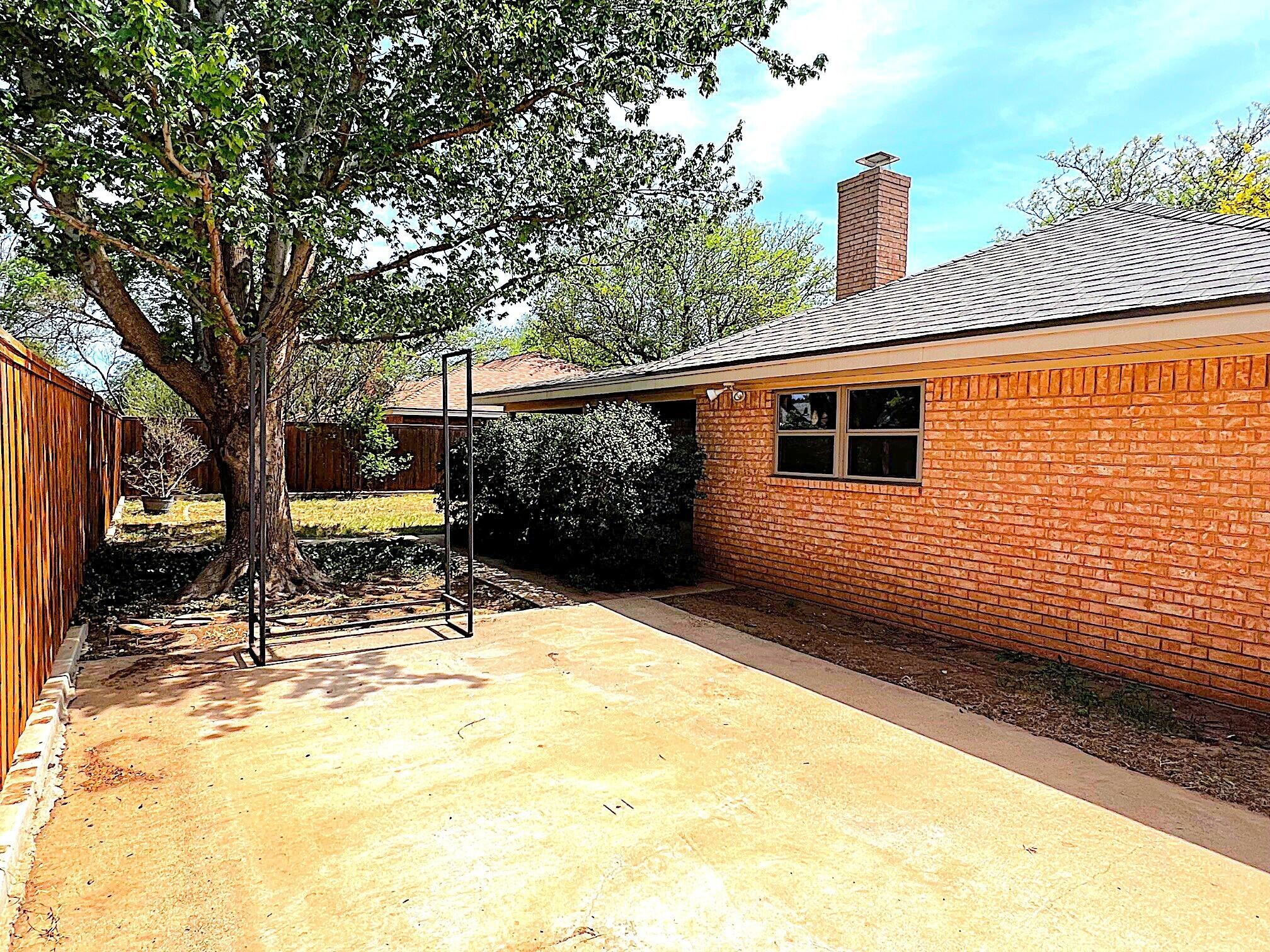 3506 86th Street Lubbock, TX 79423 - Photo 28 of 29 a view of a house with snow on the road