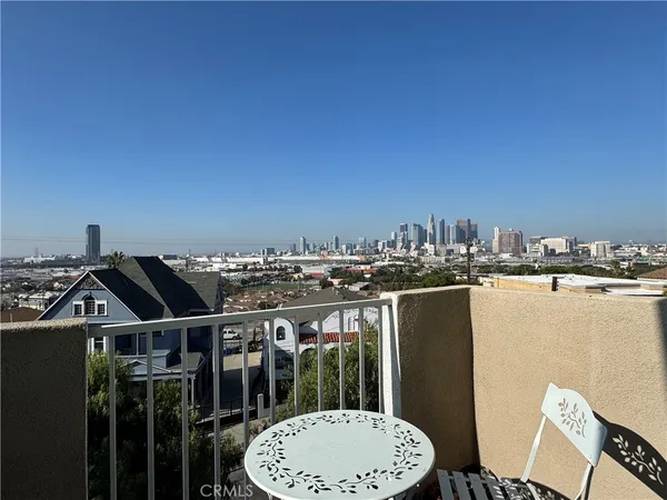 a view of a chairs and table in the terrace
