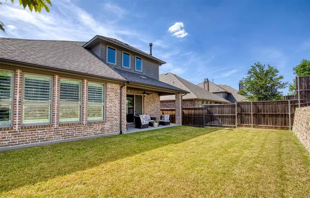 a view of a house with a swimming pool