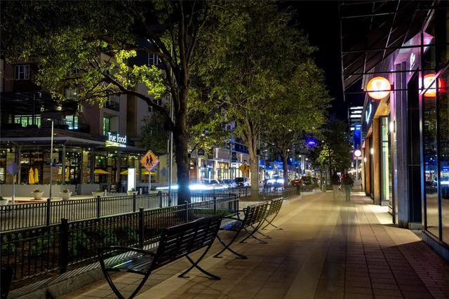a view of a street with lots of trees