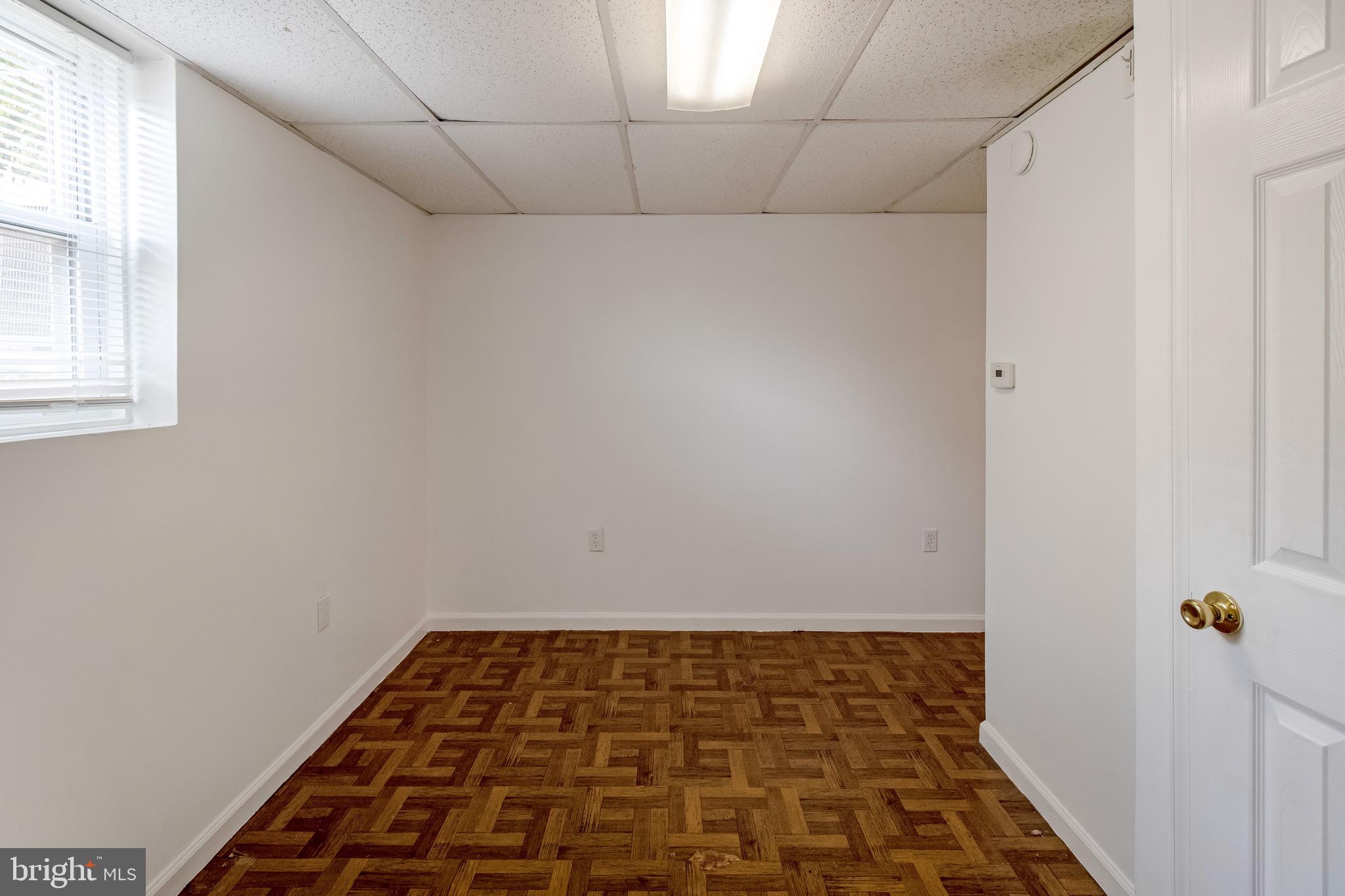 11521 Goodloe Road Silver Spring, MD 20906 - Photo 17 of 21 Basement bedroom