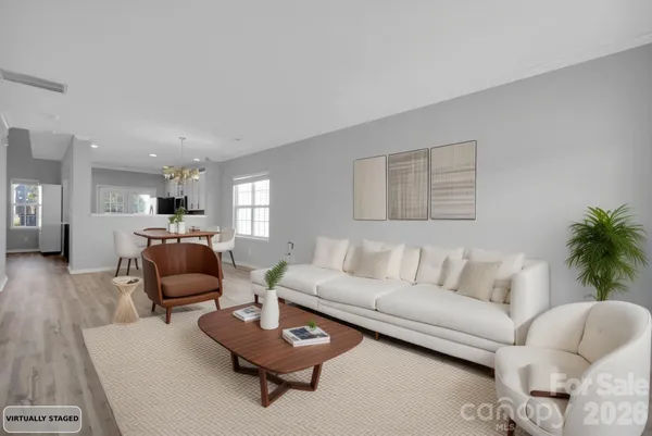 a living room with furniture and a couch