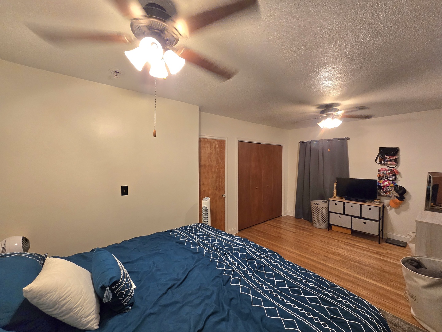 255 South Fourth Street Clifton, IL 60927 - Photo 15 of 34 a bedroom with a bed and a chandelier