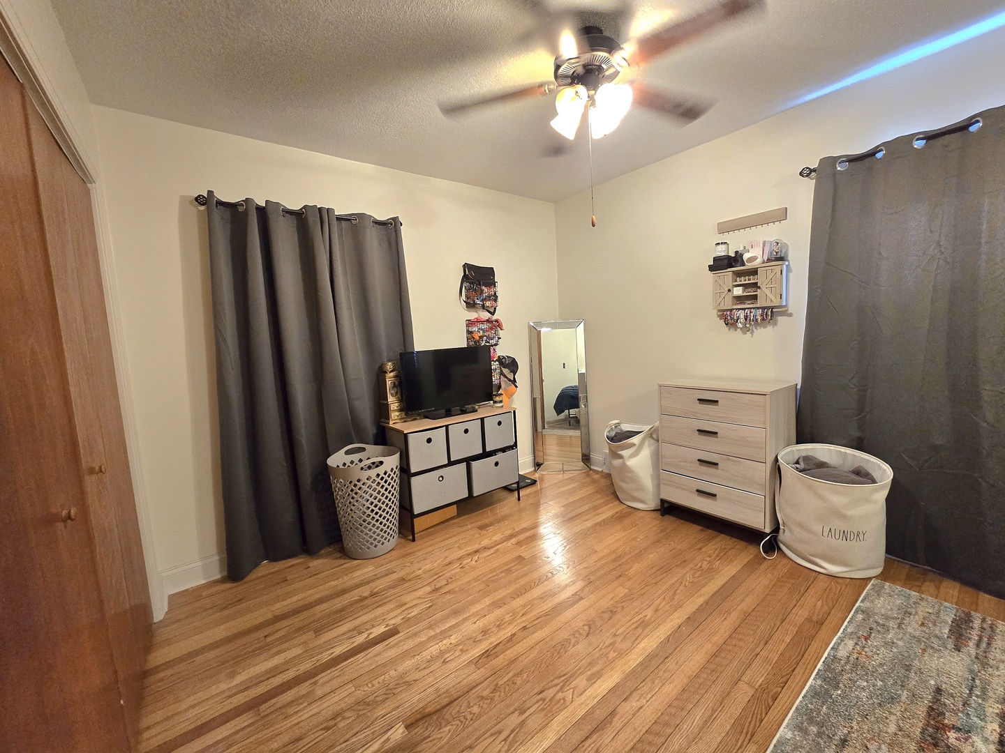 255 South Fourth Street Clifton, IL 60927 - Photo 16 of 34 a bedroom with furniture and a flat screen tv
