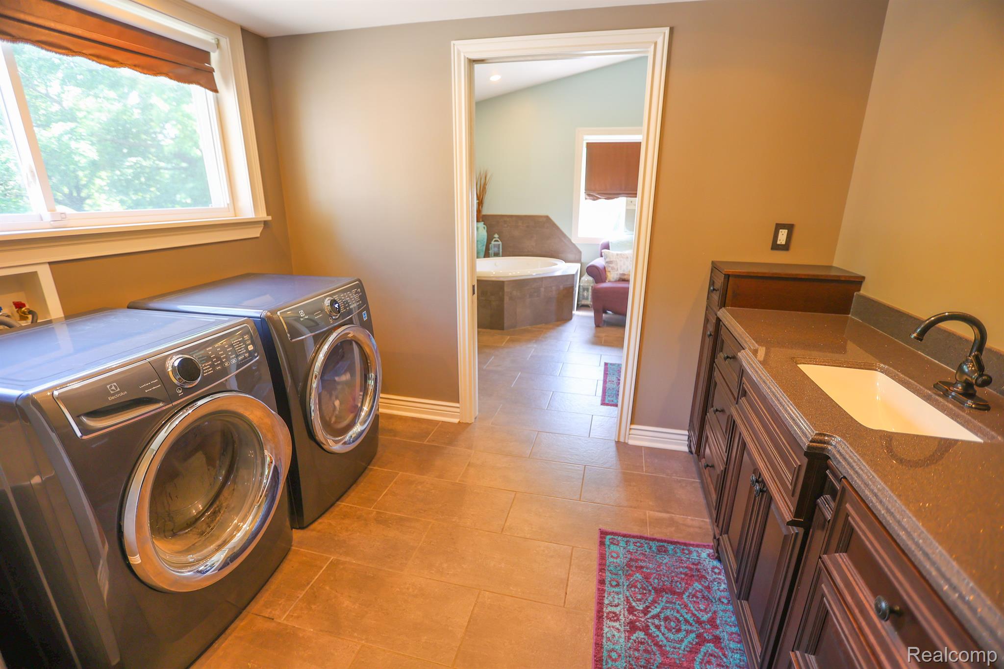 15183 Fish Lake Road Holly, MI 48442 - Photo 26 of 34 New Addition has 1st Floor Laundry Room