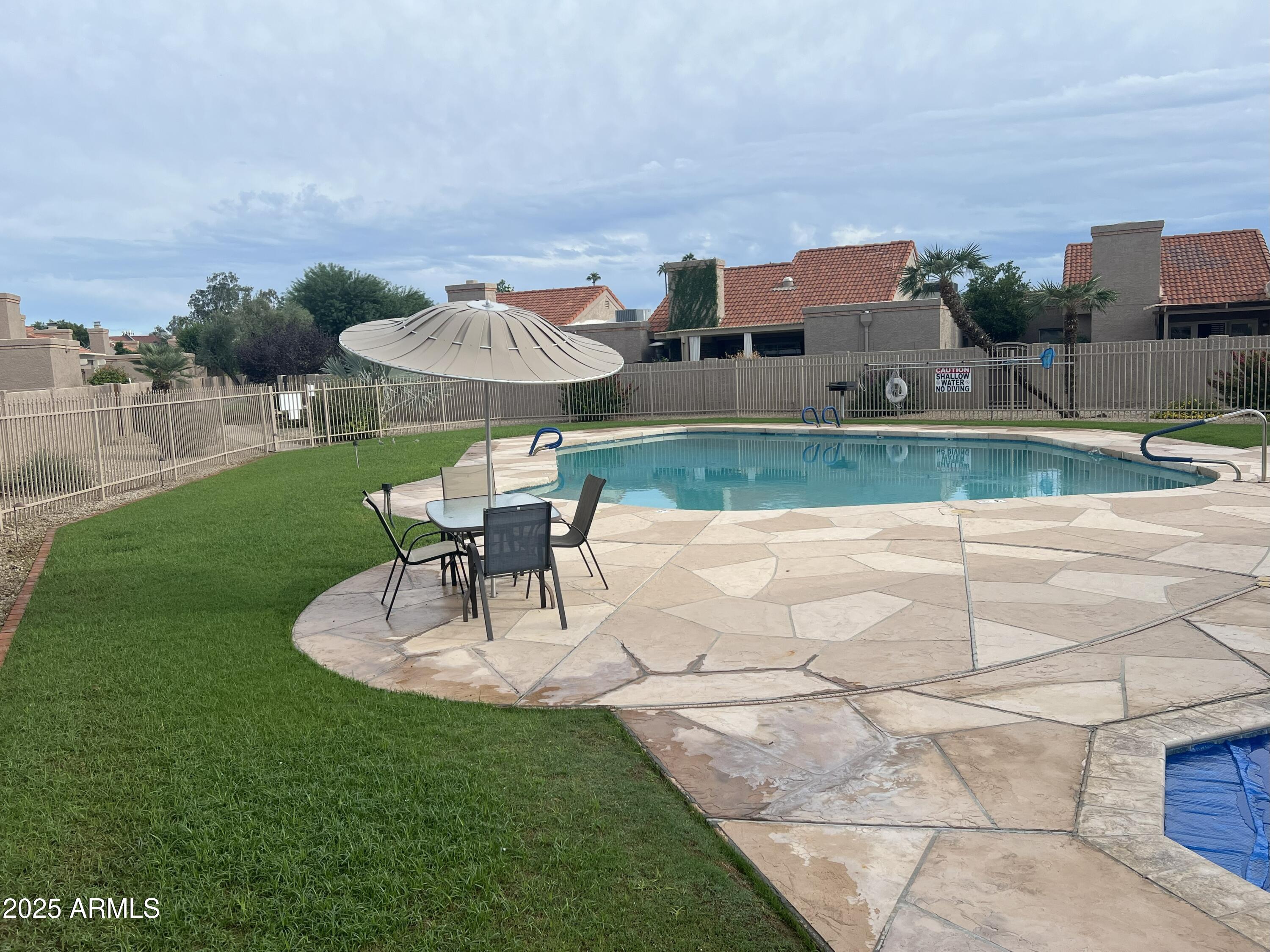 4011 East Charter Oak Road Phoenix, AZ 85032 - Photo 23 of 31 a view of a house with a yard