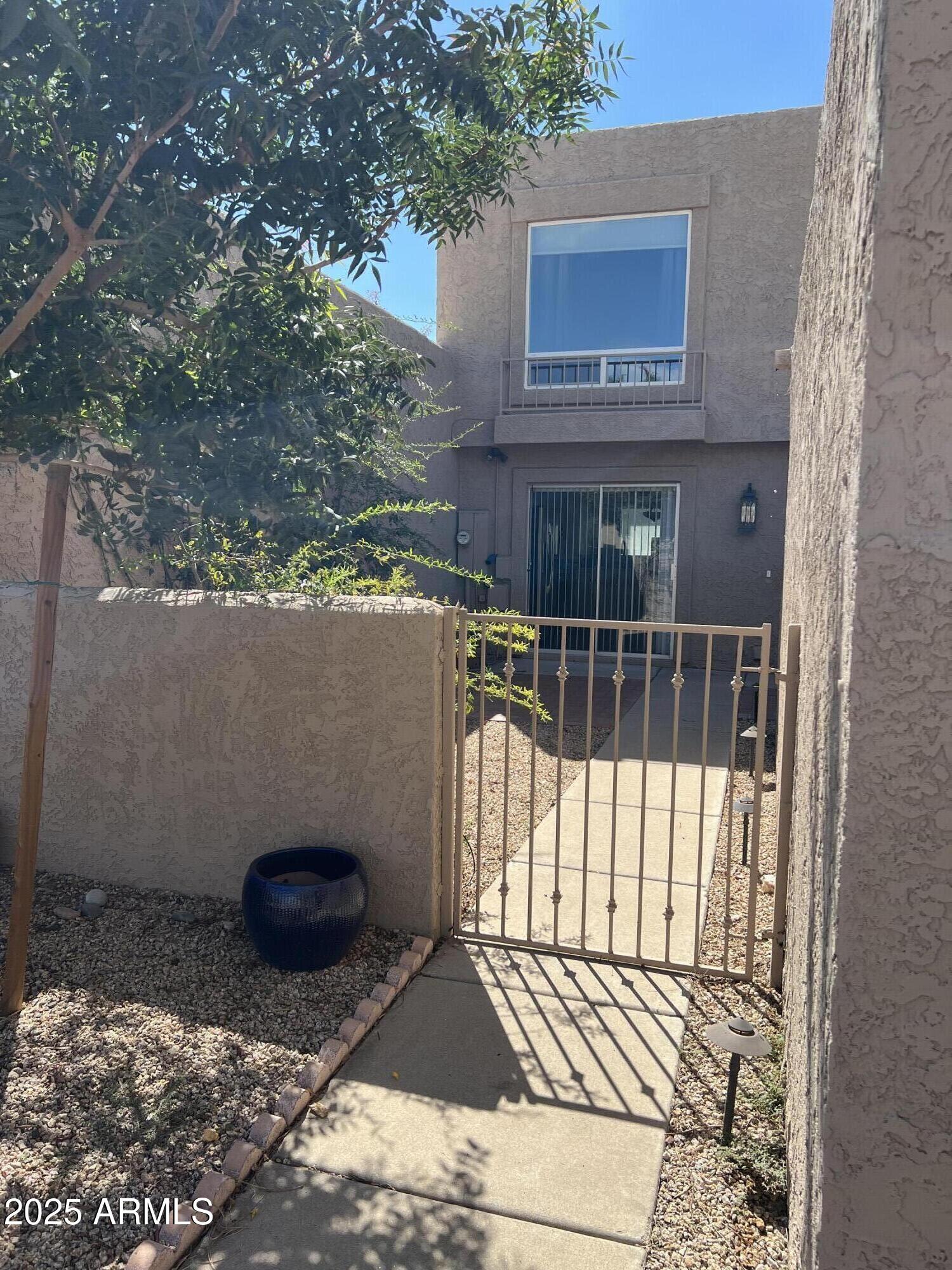 4011 East Charter Oak Road Phoenix, AZ 85032 - Photo 4 of 31 a view of outdoor space deck and kitchen