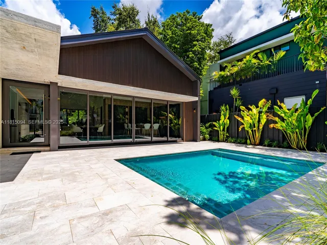 a view of a house with a swimming pool