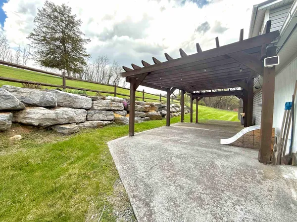 a view of house with outdoor space