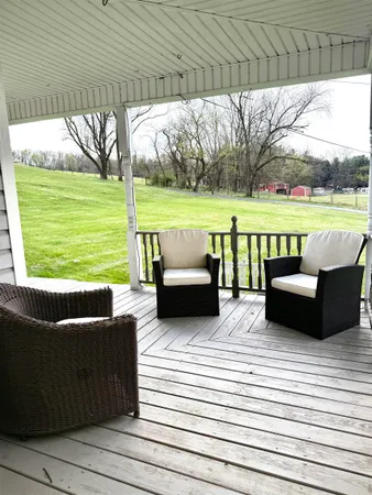 a view of a yard with an outdoor space