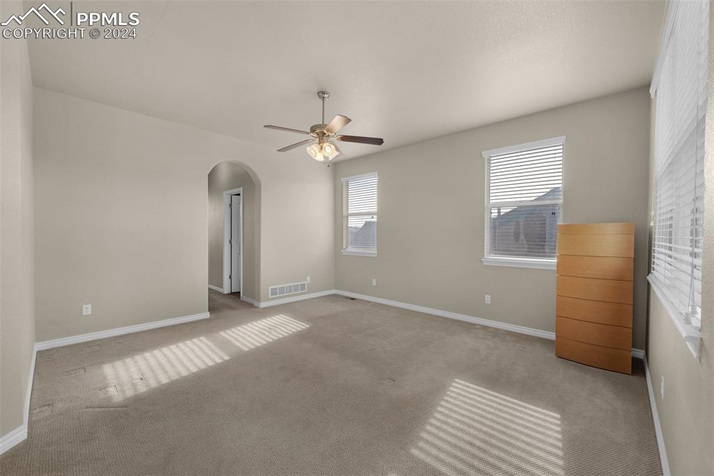 1053 Crystal Basin Drive Colorado Springs, CO 80921 - Photo 25 of 49 a view of an empty room with a window