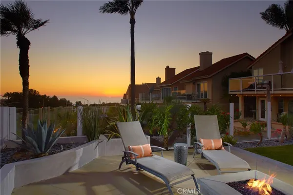 a view of a terrace with furniture and garden