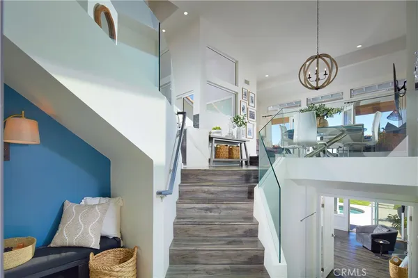 a view of entryway with wooden floor