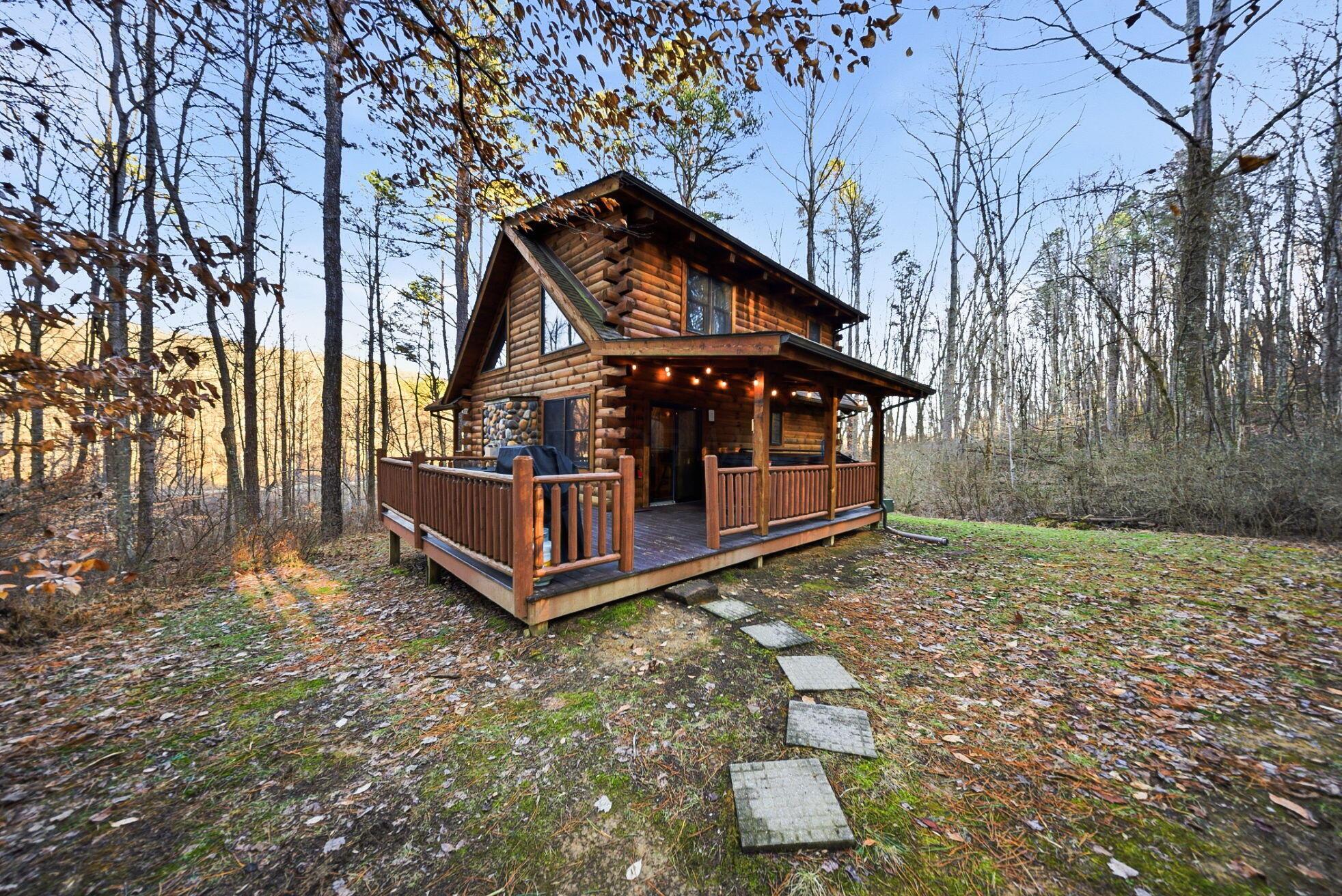 15399 Clapper Hollow Road Laurelville, OH 43135 - Photo 5 of 61 Authentic Log Cabin on 6 Private Wooded Acres with Back Deck, Hot Tub, Fire Pit, Grill, and Marked Hiking Trails