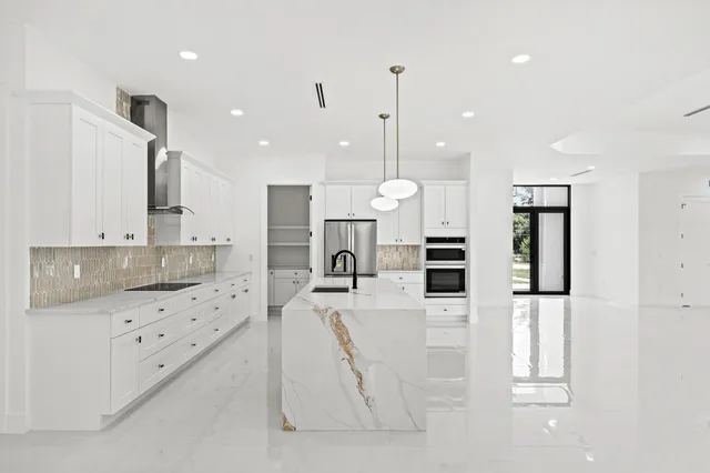 an empty room with an entryway