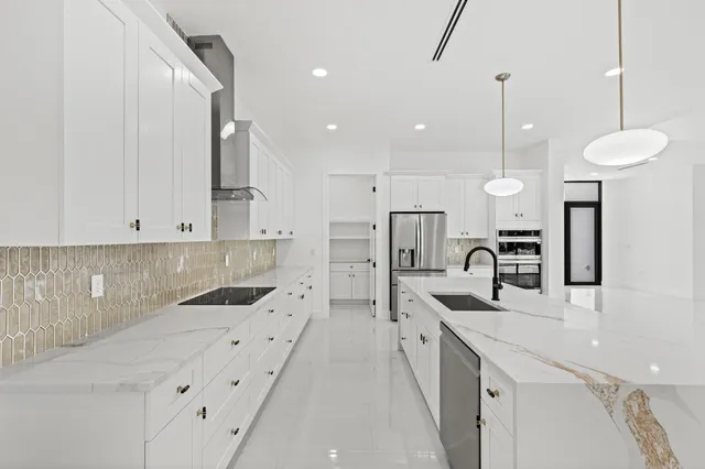a bathroom with a toilet sink and shower