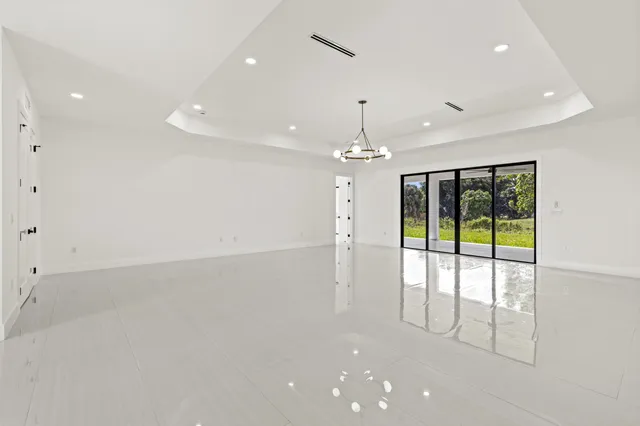 a kitchen with stainless steel appliances a refrigerator and cabinets