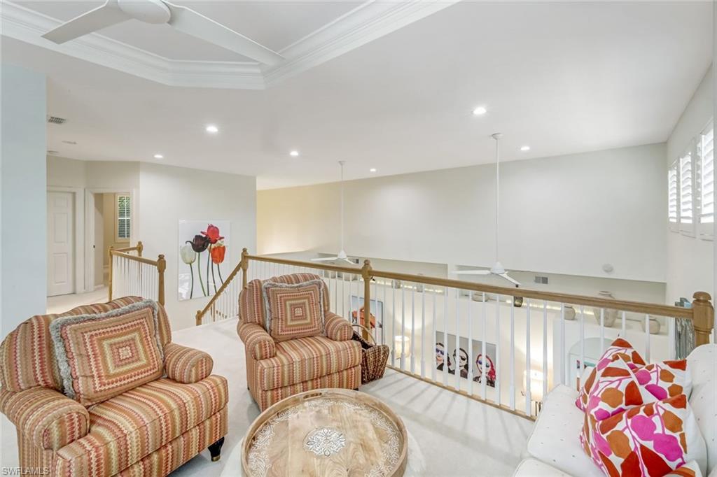 23045 Tree Crest Court Estero, FL 34135 - Photo 25 of 46 The Upstairs Features a Spacious Loft, Two Guest Bedrooms and a Full Bathroom