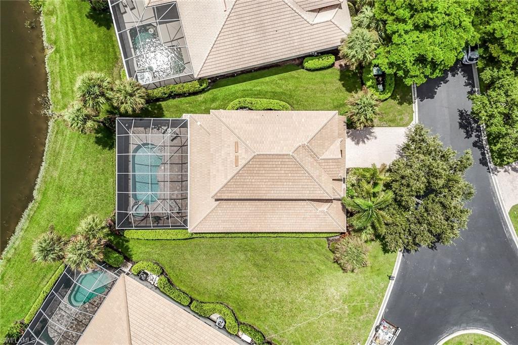 23045 Tree Crest Court Estero, FL 34135 - Photo 2 of 46 View from above, highlighting large side-yard/Pie-shaped Lot