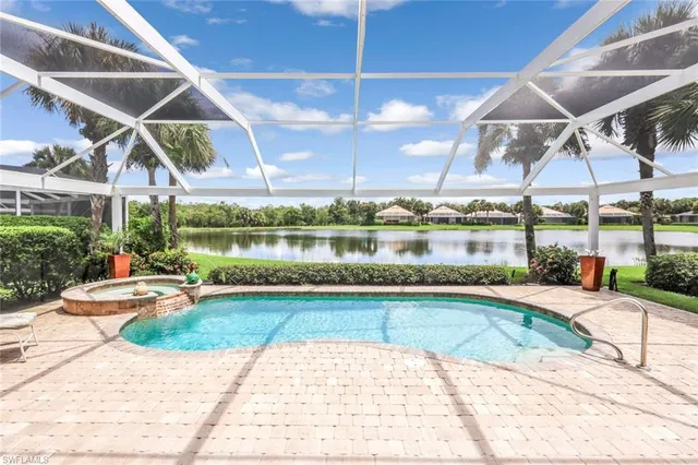 a view of a swimming pool with a patio