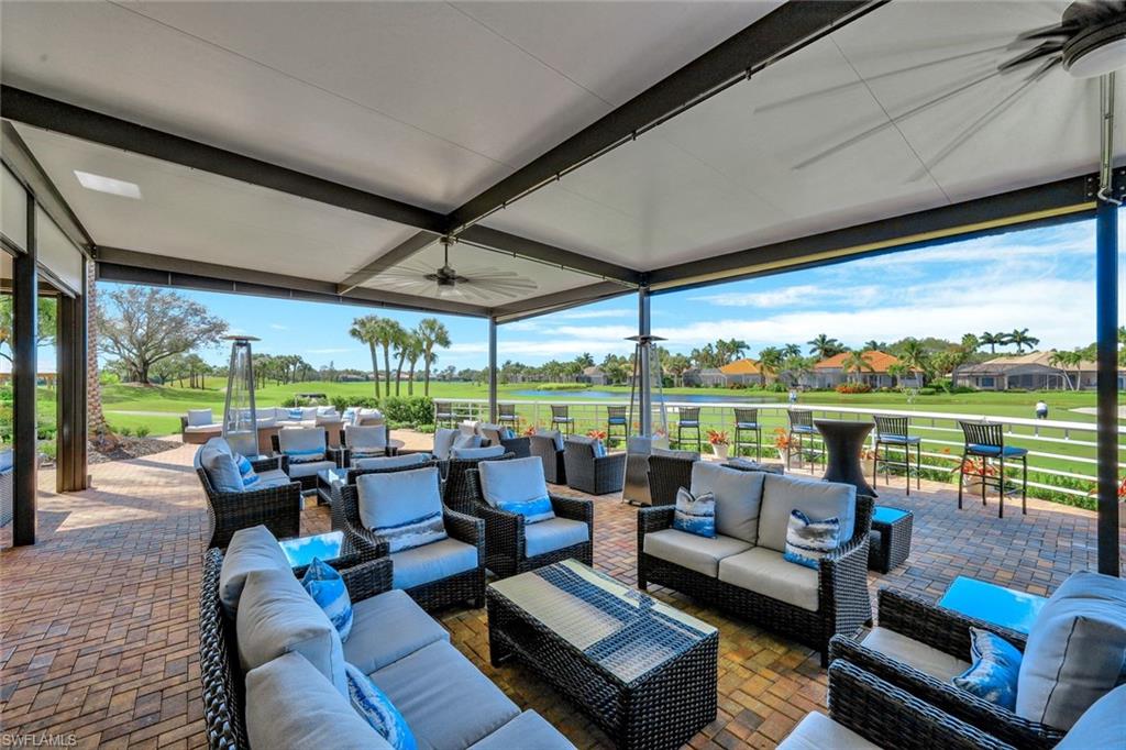 23045 Tree Crest Court Estero, FL 34135 - Photo 44 of 46 The Sunset Terrace Bar at the Club is directly adjacent to the Bocce courts
