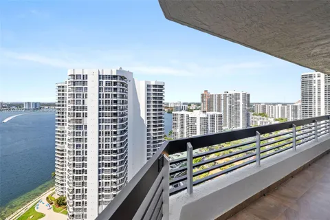 a view of city with tall buildings