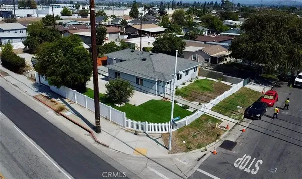 a aerial view of a house with a garden and plants