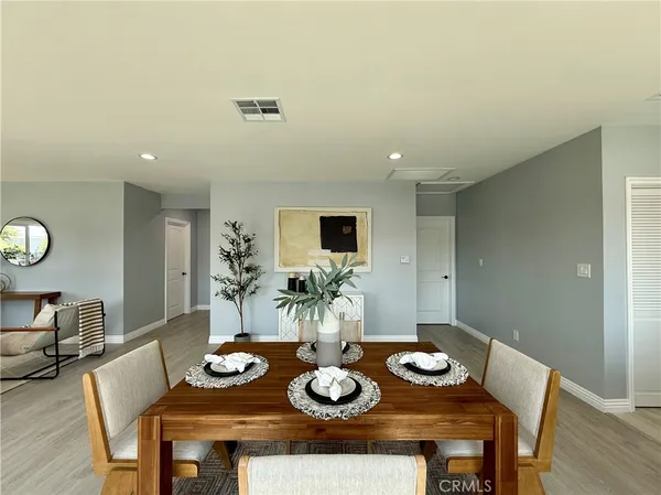 a view of a dining room with furniture