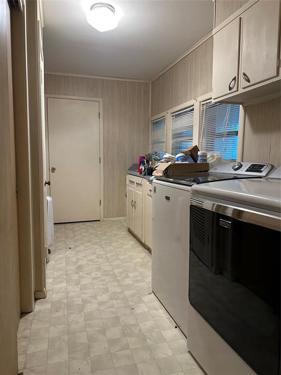 604 Harrel Avenue Bynum, TX 76631 - Photo 21 of 24 a kitchen with a stove top oven and cabinets