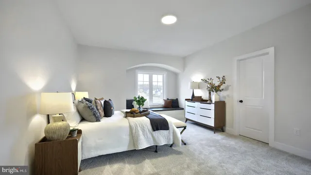 a bed room with a bed and a couch