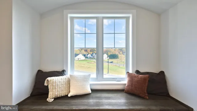 a living room with furniture and window