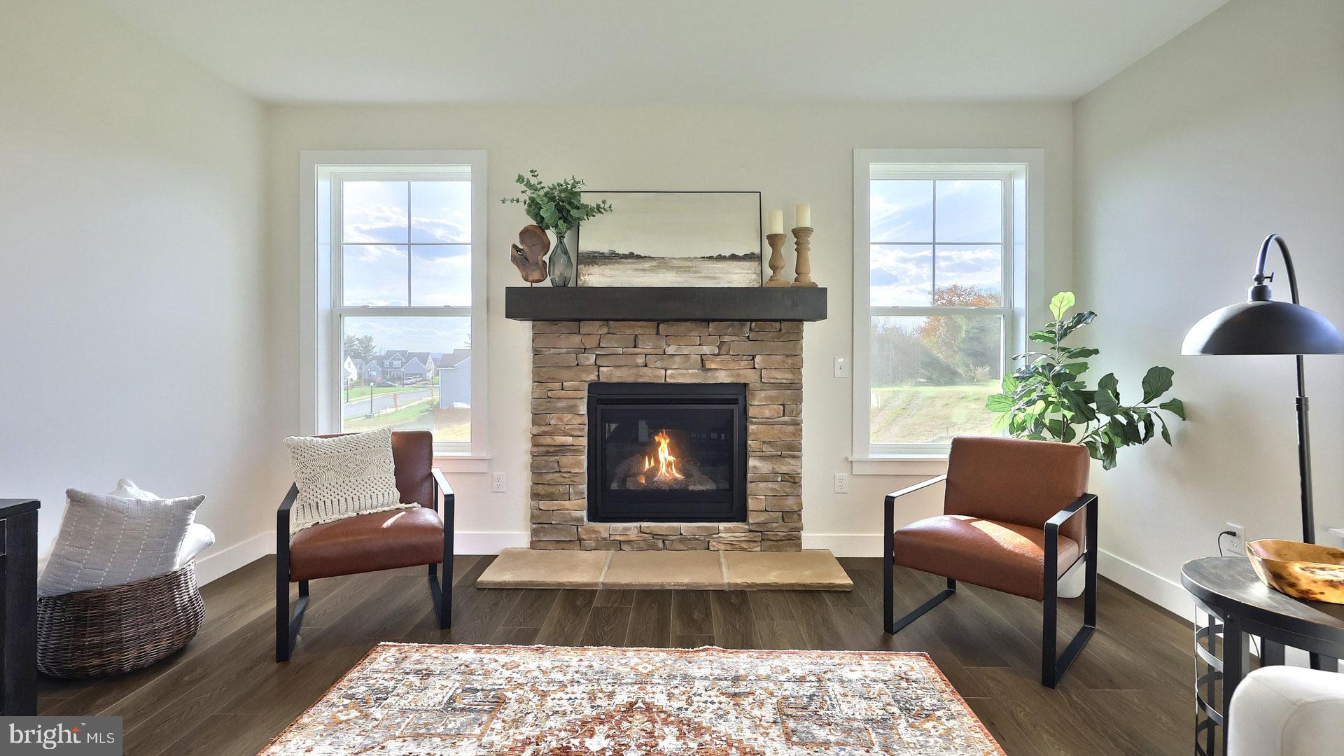 23 Vista Court Lititz, PA 17543 - Photo 5 of 27 a living room with furniture and a fireplace