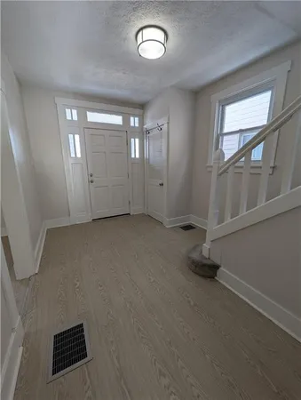 an empty room with windows