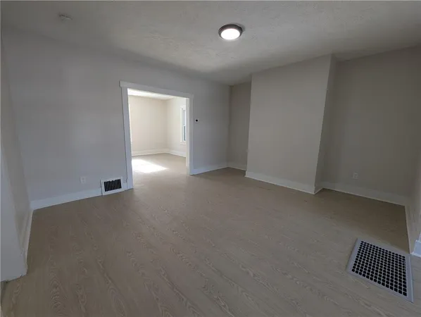 an empty room with a natural light