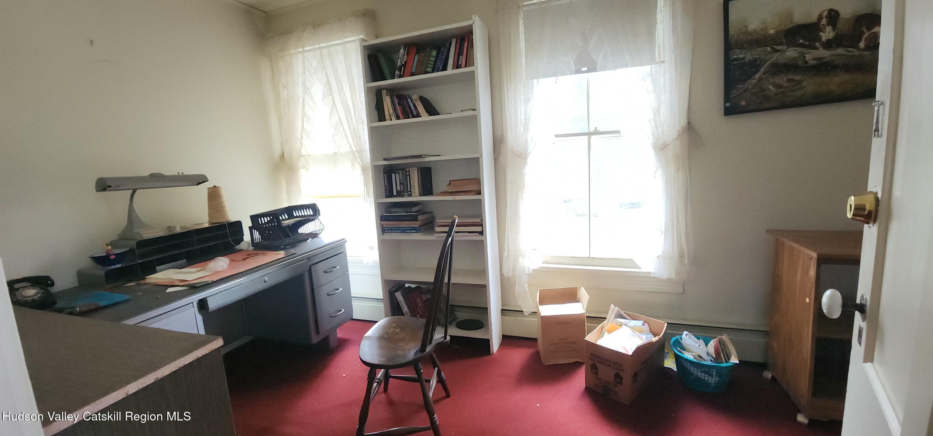 293 Carl Road Jewett, NY 12444 - Photo 14 of 20 a view of a workspace with furniture and a window