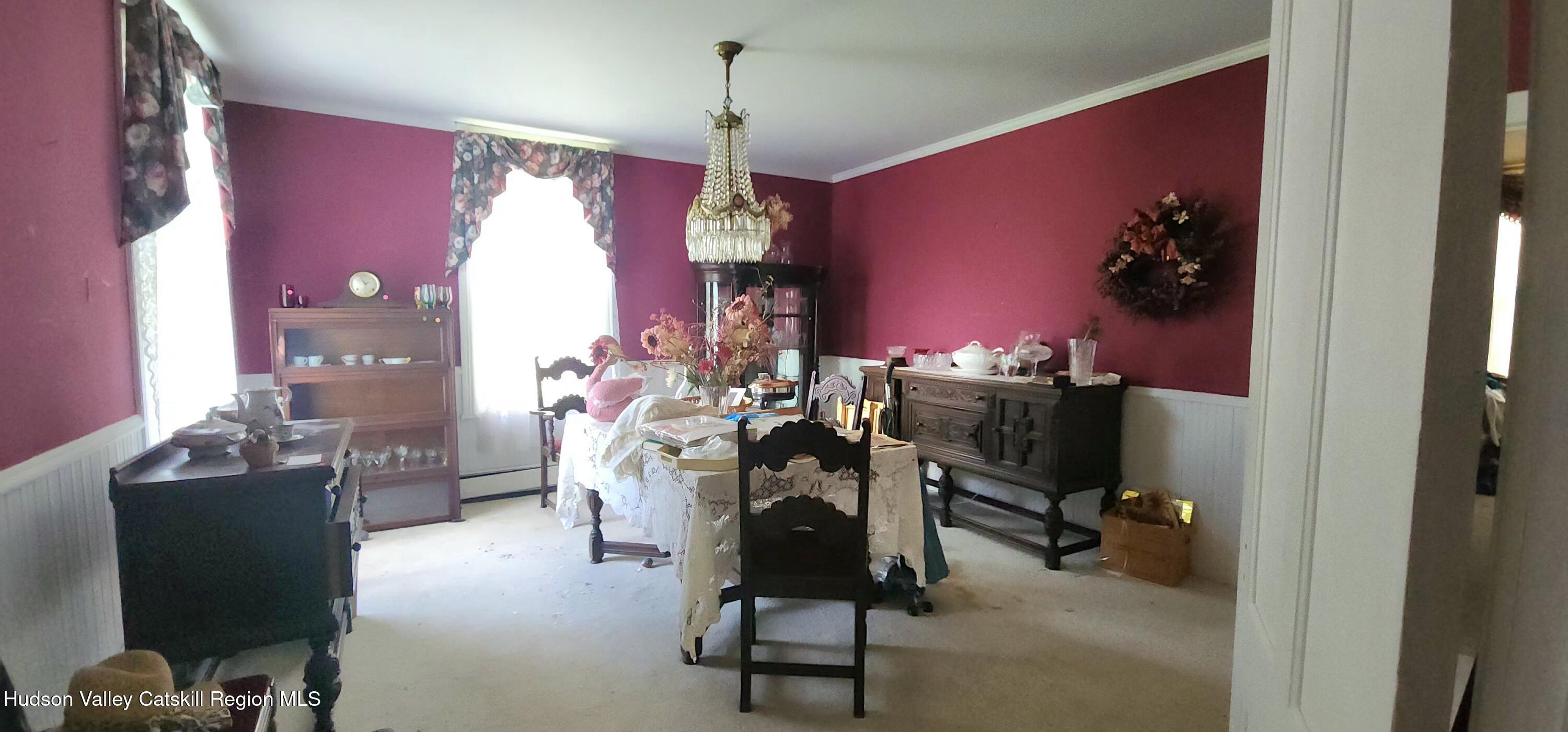 293 Carl Road Jewett, NY 12444 - Photo 17 of 20 a view of a workspace with furniture and a window