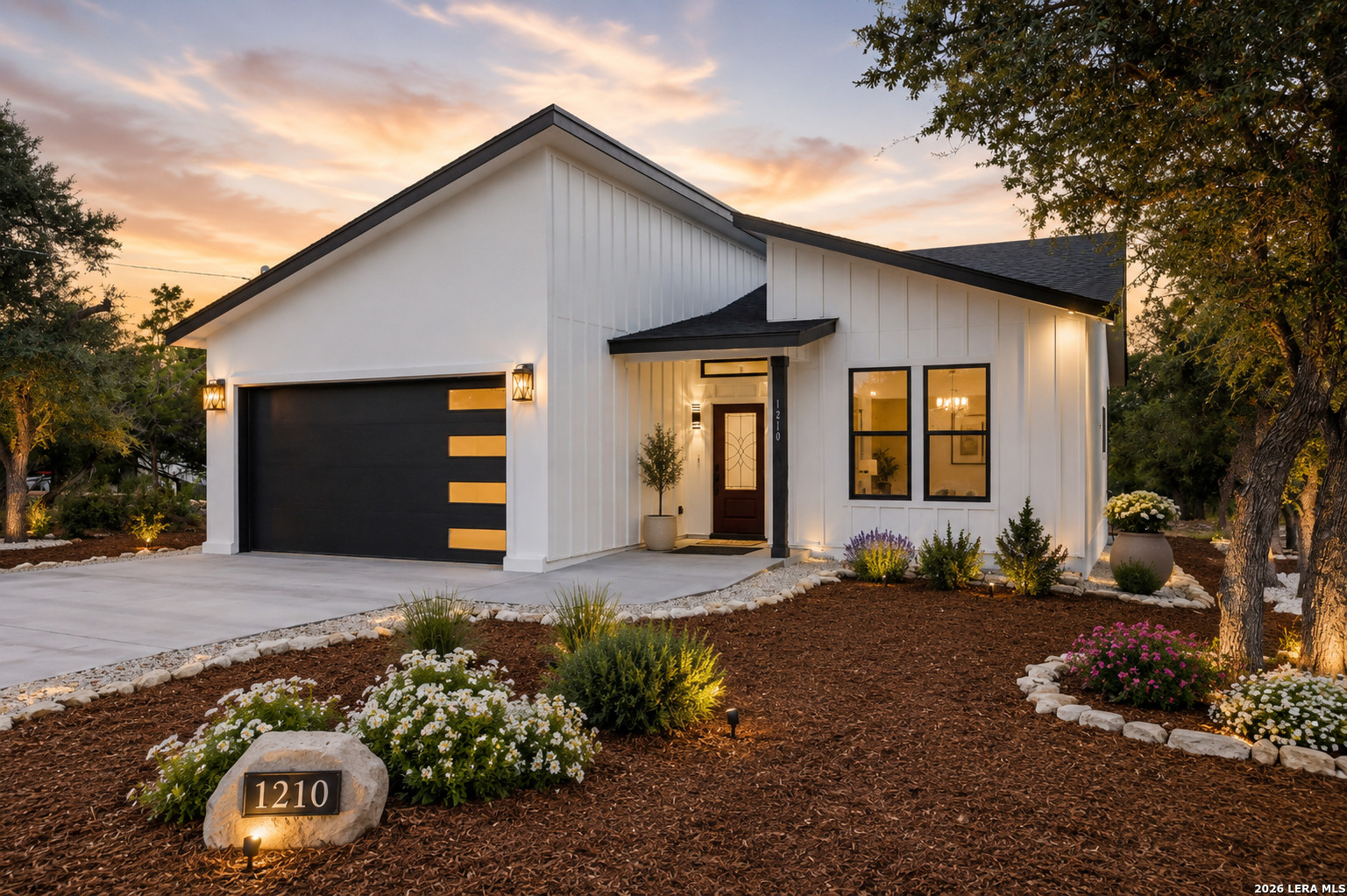 1210 Fernwood Road Fischer, TX 78623 - Photo 1 of 36 a front view of a house with a yard