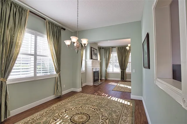 a view of a hallway with windows