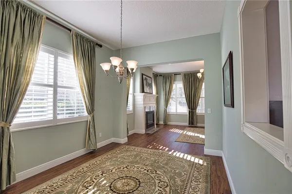 a view of a hallway with windows
