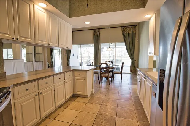 a view of a kitchen with granite countertop lots of counter top space