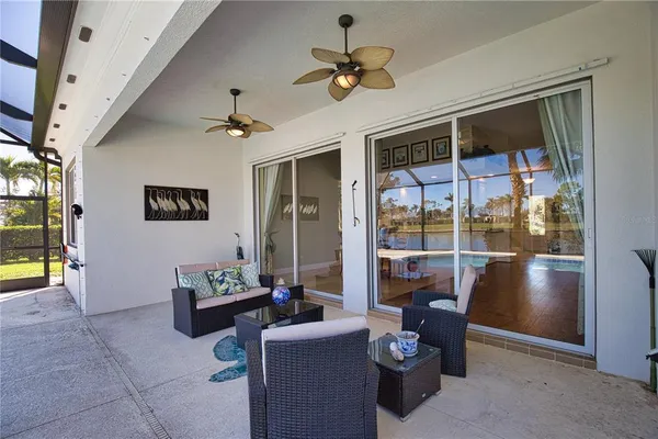 a view of a swimming pool with a patio