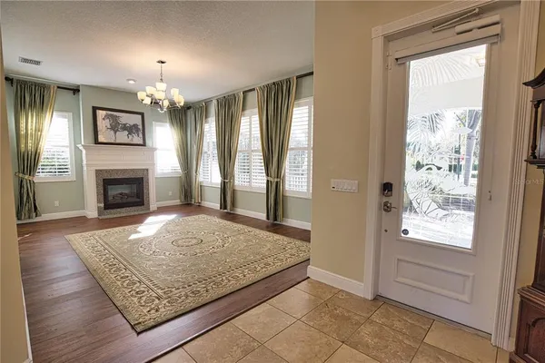 a view of livingroom with hardwood floor and a fireplace