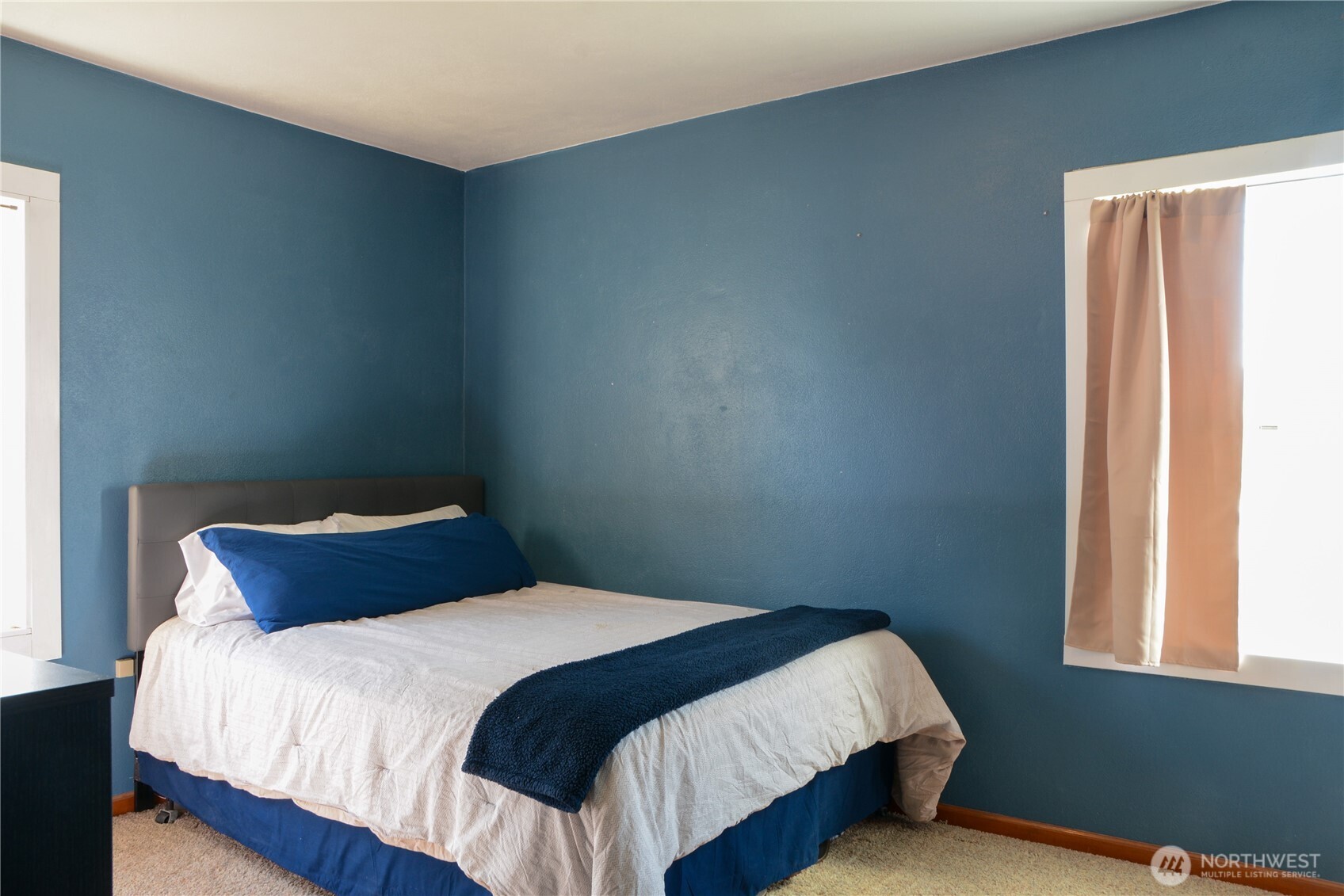 112 East 5th Street Lind, WA 99341 - Photo 20 of 39 a bedroom with a bed and window