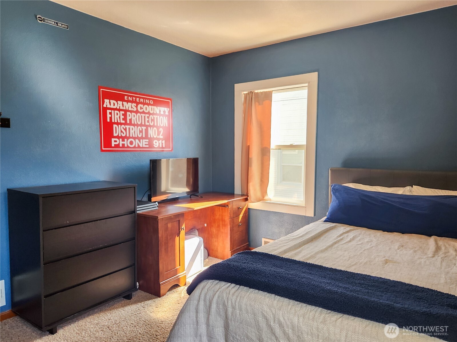 112 East 5th Street Lind, WA 99341 - Photo 21 of 39 a bedroom with a bed and a window