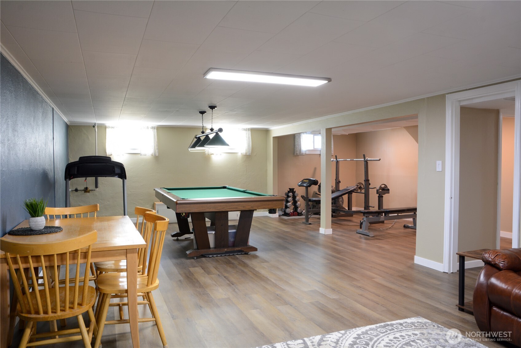 112 East 5th Street Lind, WA 99341 - Photo 26 of 39 a view of a dining room with furniture and wooden floor