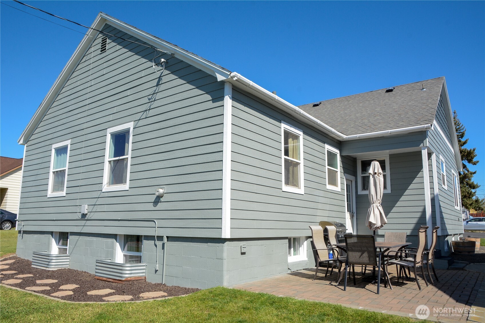 112 East 5th Street Lind, WA 99341 - Photo 35 of 39 a front view of house with yard and seating area