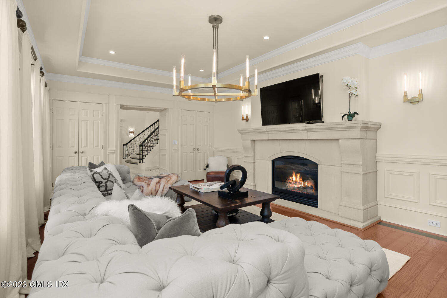 28 Dairy Road Greenwich, CT 06830 - Photo 14 of 44 a living room with furniture a flat screen tv and a fireplace